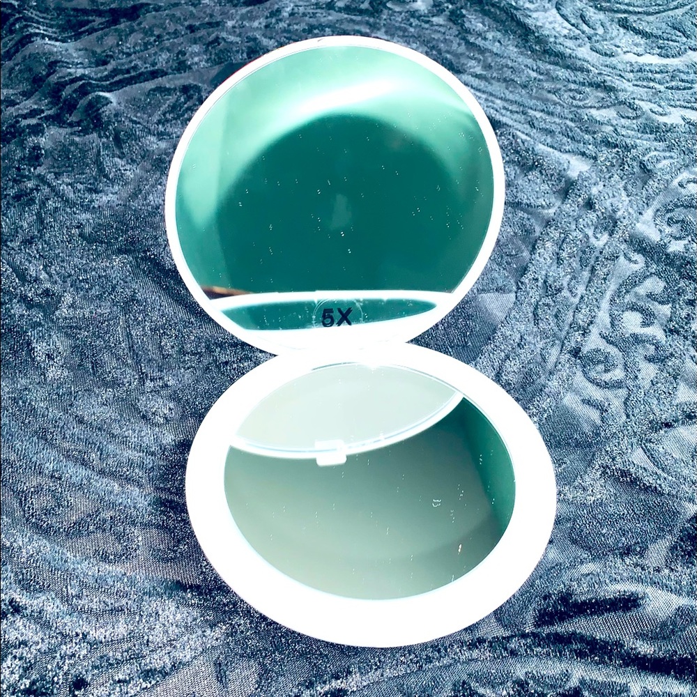 Light up Travel size mirror.